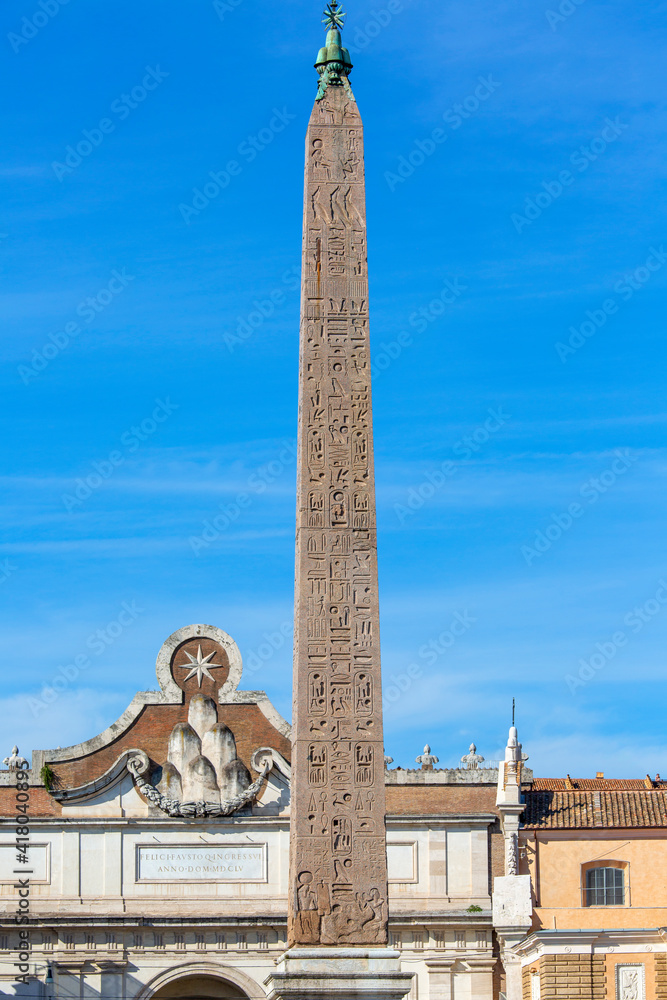 An Egyptian obelisk ( Flaminio Obelisk) of Ramesses II in the centre of the Piazza del Popolo and Porta del Popolo, Rome, Italy