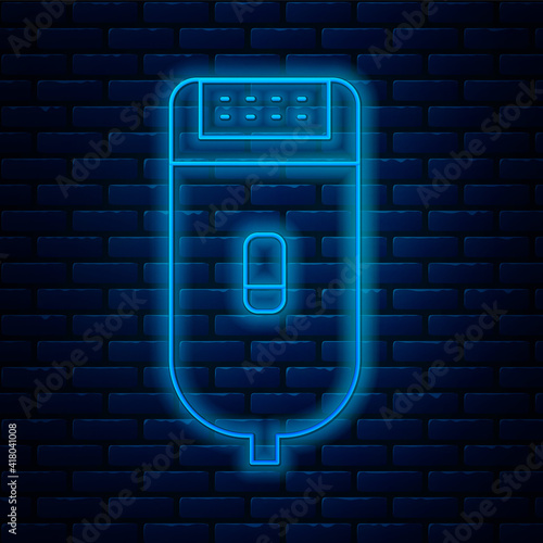 Glowing neon line Electrical hair clipper or shaver icon isolated on brick wall background. Barbershop symbol. Vector Illustration.