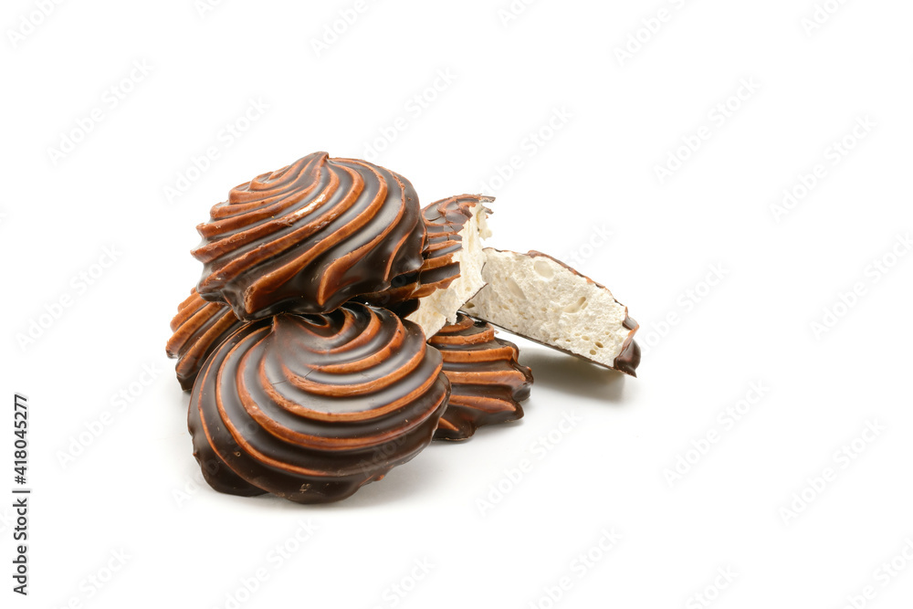 Chocolate-covered marshmallow close-up, isolated on a white background.Selective focus.
