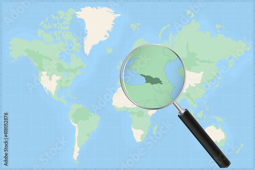 Map of the world with a magnifying glass on a map of Georgia.
