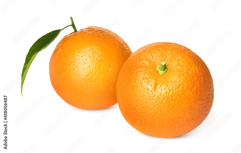 Fresh ripe oranges with green leaf on white background Fresh ripe oranges with green leaf on white background
