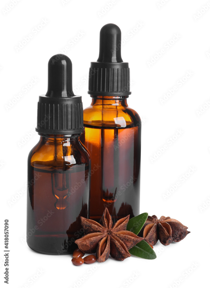 Anise essential oil and spice on white background Anise essential oil and spice on white background