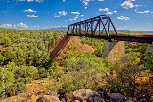 Railway Trestle Bridge over Bear Canyon with Mingus mountain in the distance, Perkinsville, Arizona, USA photo