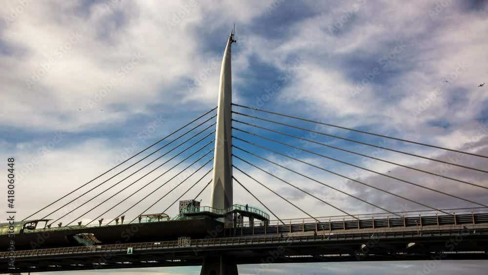 Tourists and local people sit and watch the beautiful Golden Horn under the new Golden Horn ( Halic ) metro bridge in Istanbul city. Tourists and local people sit and watch the beautiful Golden Horn under the new Golden Horn ( Halic ) metro bridge in Istanbul city.