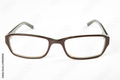 Eyeglasses with brown rim on white background