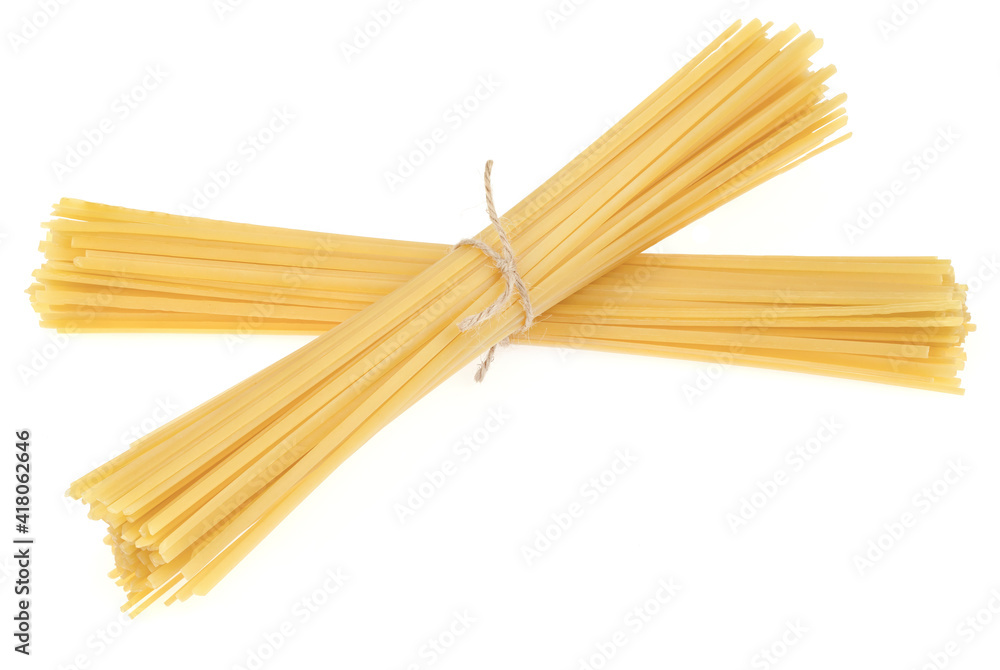Bunch of pasta isolated on white background. spaghetti tied with rope Bunch of pasta isolated on white background. spaghetti tied with rope