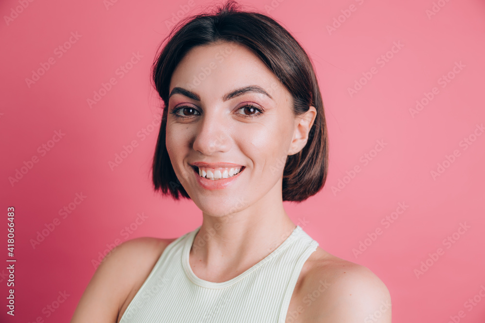Woman on pink background happy face smiling looking at the camera. Positive person. Woman on pink background happy face smiling looking at the camera. Positive person.