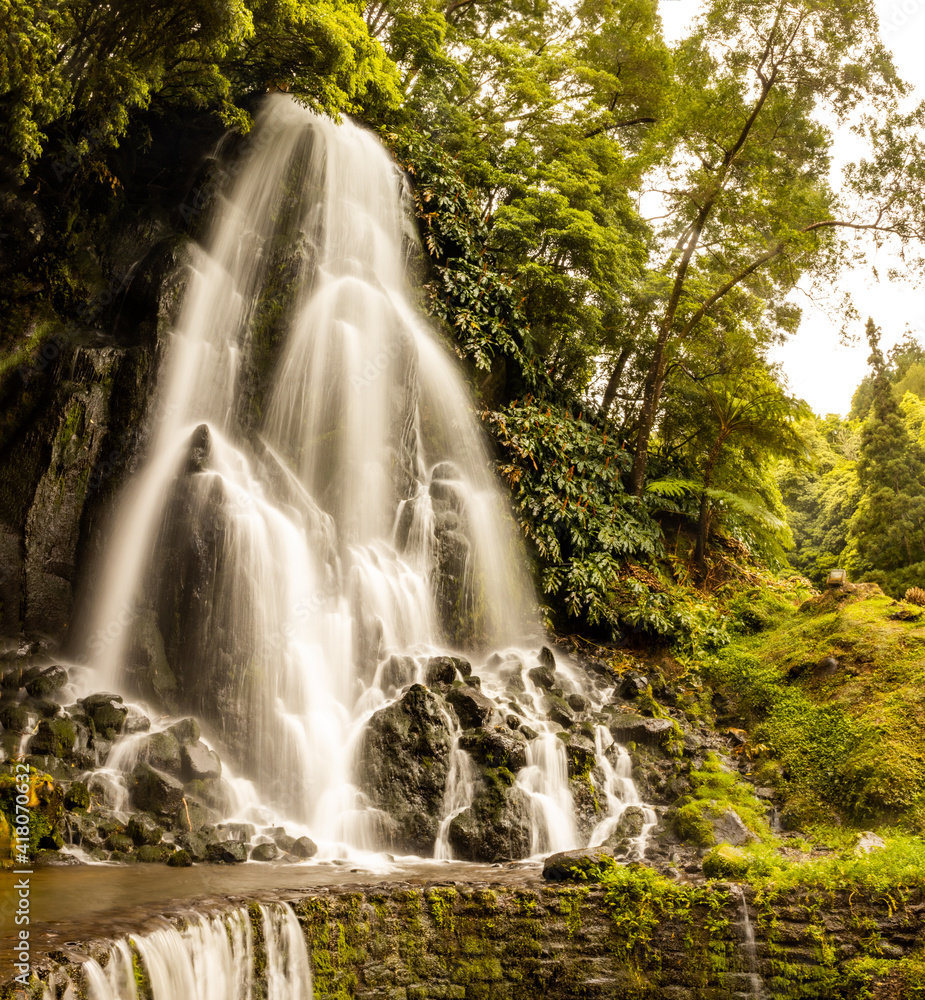 Wonderful waterfall at Azores travel destination, Sao Miguel island.
