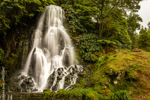 Fototapeta Naklejka Na Ścianę i Meble -  Wonderful waterfall at Azores travel destination, Sao Miguel island.