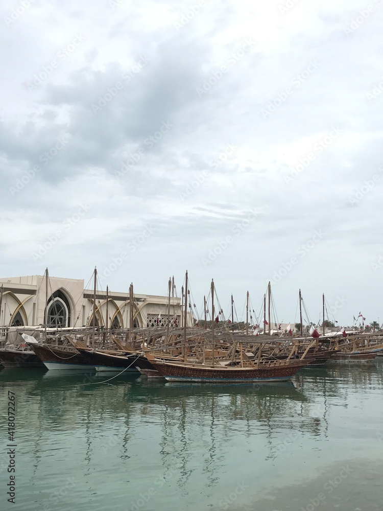 Closeup image of traditional dhows along the Doha Corniche in Qatar