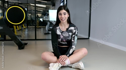 beautiful brunette girl fitness instructor.