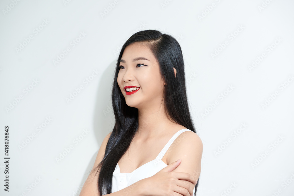 Happy young Asian woman close up shot isolated on white background. Happy young Asian woman close up shot isolated on white background.