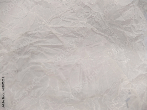 crumpled white paper texture and background closeup photo