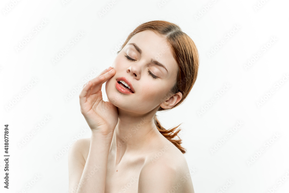 woman makeup on face naked shoulders gathered hair attractive look woman makeup on face naked shoulders gathered hair attractive look