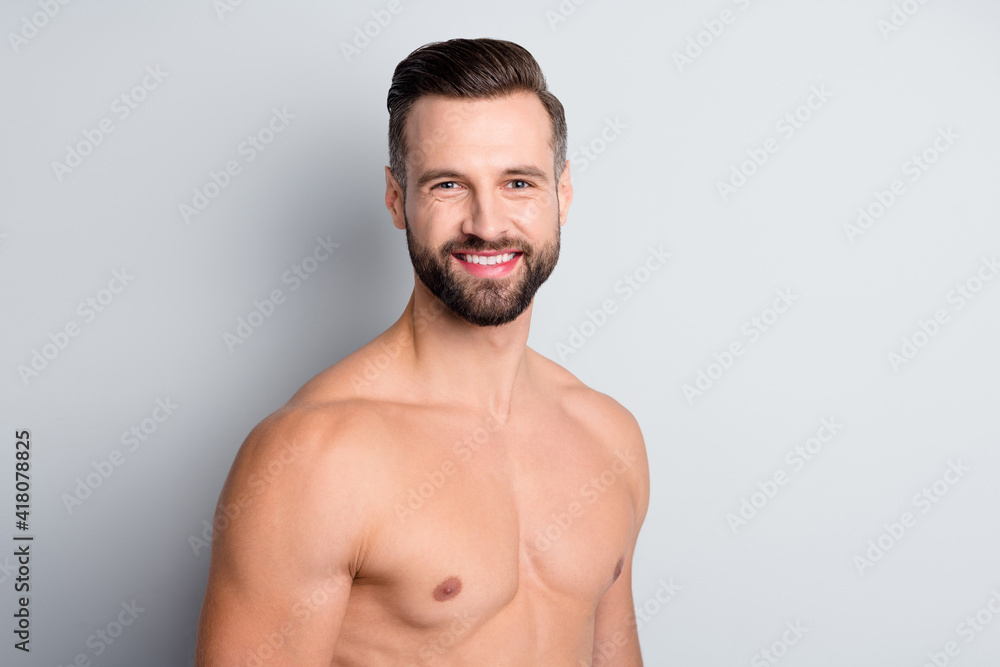 Photo of young handsome man happy positive smile pure fresh skin after shower isolated over grey color background Photo of young handsome man happy positive smile pure fresh skin after shower isolated over grey color background