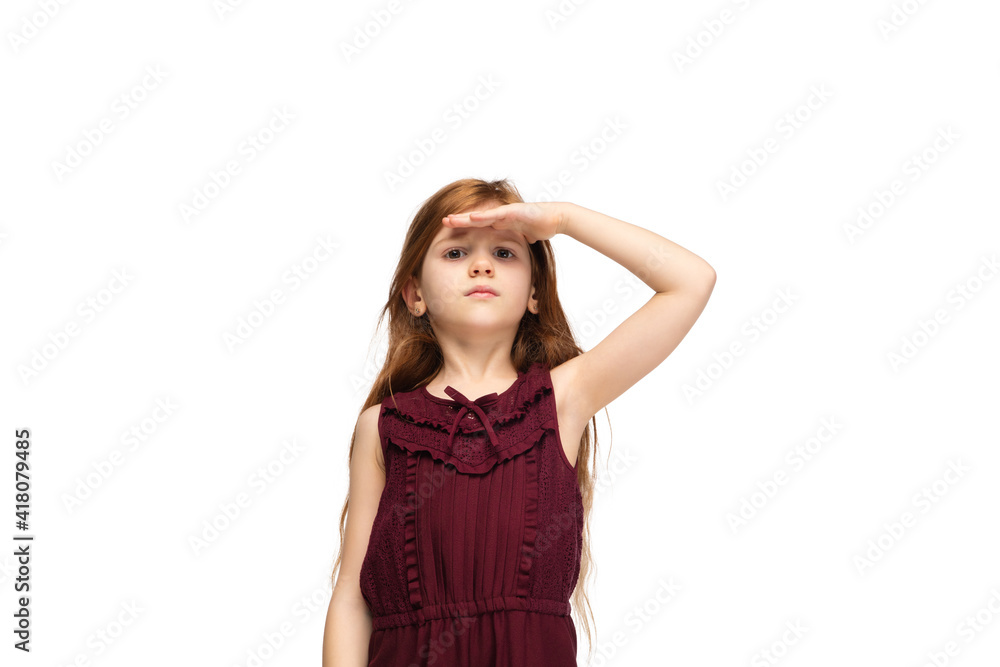 Looking forward. Happy, smiley little caucasian girl isolated on white studio background with copyspace for ad. Looks happy, cheerful. Childhood, education, human emotions, facial expression concept. Looking forward. Happy, smiley little caucasian girl isolated on white studio background with copyspace for ad. Looks happy, cheerful. Childhood, education, human emotions, facial expression concept.