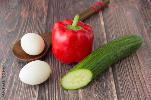 red paprika, cucumber and two eggs
