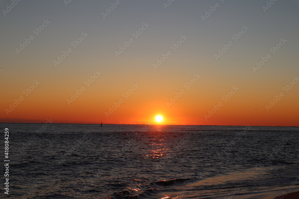 Naklejka premium sunset on the beach