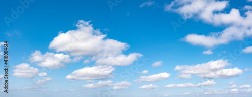 Beautiful blue sky with clouds, wide panorama