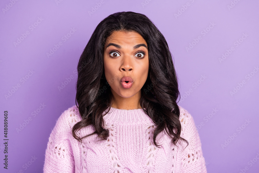 Photo of adorable shocked dark skin lady dressed knitted pullover lips pouted big eyes isolated purple color background Photo of adorable shocked dark skin lady dressed knitted pullover lips pouted big eyes isolated purple color background