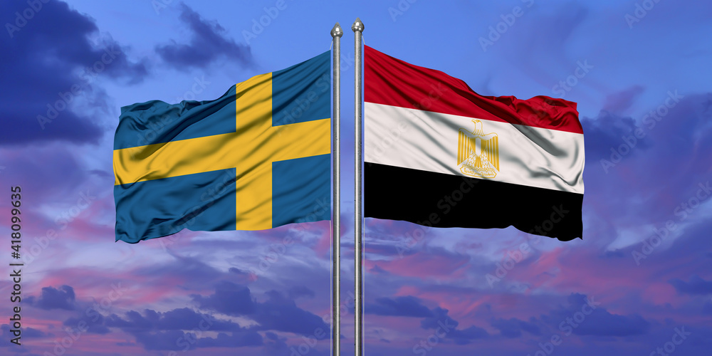 Egypt and Sweden flag waving in the wind against white cloudy blue sky together. Diplomacy concept, international relations.