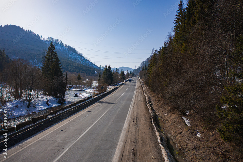 Aerial view on mountain road from drone in Aerial view on mountain road from drone in