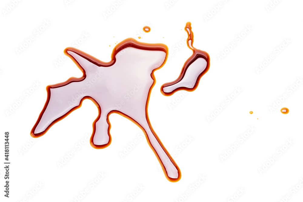 Fototapeta premium soy sauce drip isolated on a white background. soya sauce swirl cut out. above view. studio shot