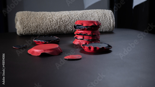 Red and black holistic medicine or alternative medicine biomagnetism magnets placed on a health therapy stretcher