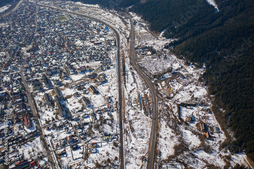 Aerial view on mountain road from drone in