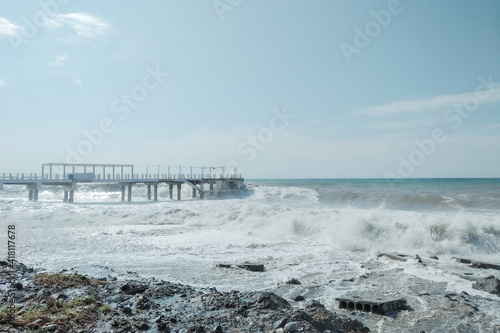 Waves crash on the shore. Storm into the rocky beach. Landscape of Batumi  Georgia