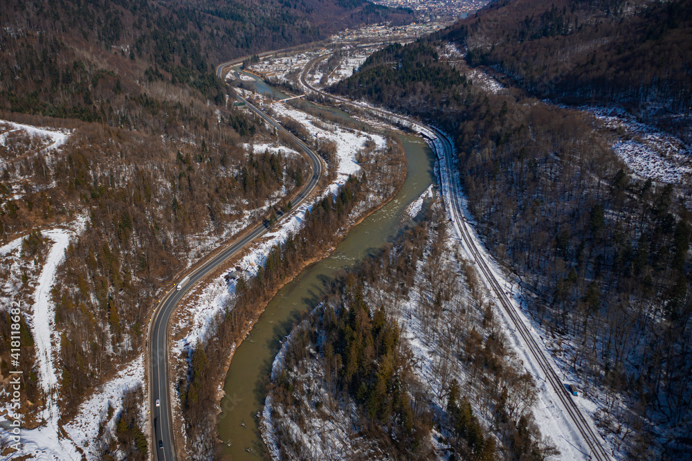 Aerial view on mountain road from drone in