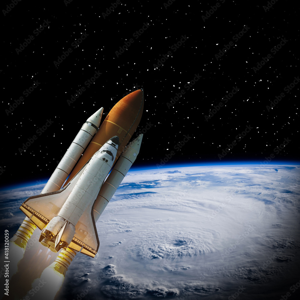 Naklejka premium Rocket above earth. The elements of this image furnished by NASA.