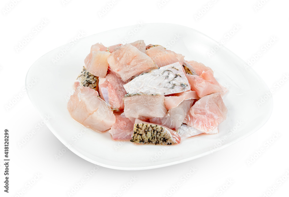 barramundi or seabass fish sliced with dish isolated on white background ,include clipping path