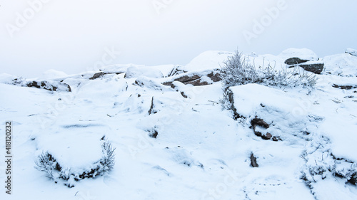 Fototapeta Naklejka Na Ścianę i Meble -  Viewpoint Trojmorski Wierch, rocks covered with snow.