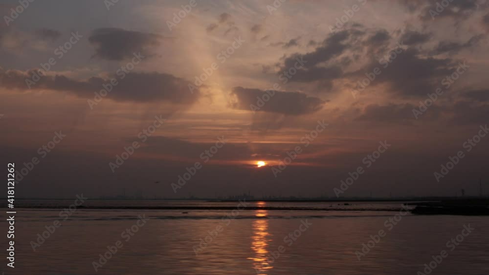 Sunset view from boat along water background movement peaceful Sunset view from boat along water background movement peaceful