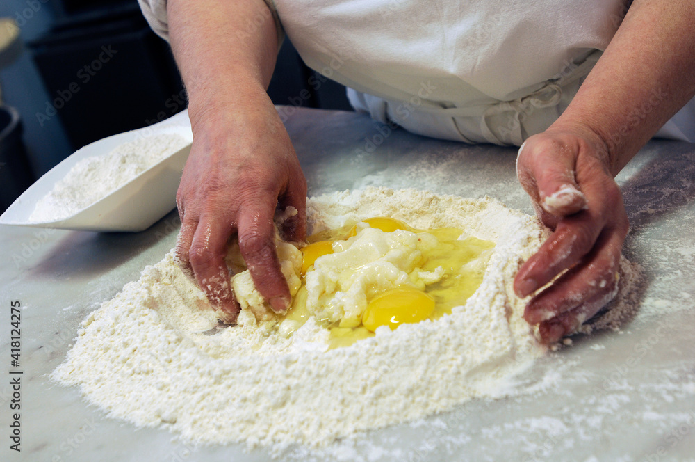 The ciaramicola is a typical Umbrian Easter cake; it is a donut-shaped cake, red in color with white icing and colored topping sprinkles The ciaramicola is a typical Umbrian Easter cake; it is a donut-shaped cake, red in color with white icing and colored topping sprinkles