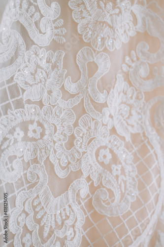 Seamless floral lace pattern on beige background