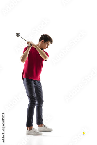 Strong, confident. Golf player in a red shirt isolated on white studio background with copyspace. Professional player practicing with emotions and facial expression. Sport, motion, action concept.