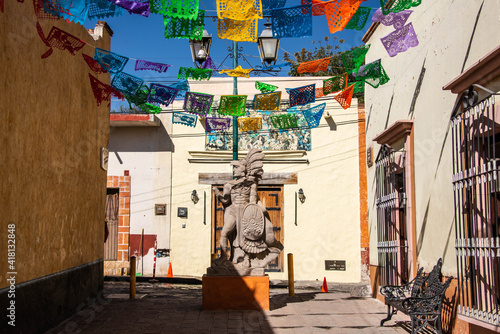 The beautiful town of Peña de Bernal, UNESCO site and one of the world’s largest monoliths looms above Bernal, Queretaro, Mexico