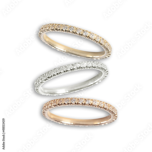 Diamonds Wedding three colors Ring group on white isolated cartier macro