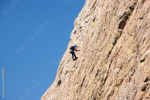 A rock climber on Peña de Bernal, UNESCO site and one of the world’s largest monoliths, Queretaro, Mexico