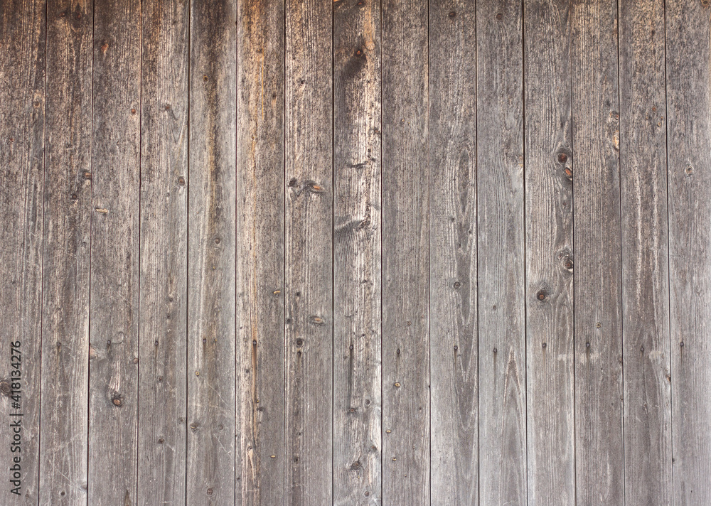 Fototapeta premium Natural wooden background.An old wooden wall darkened with age.