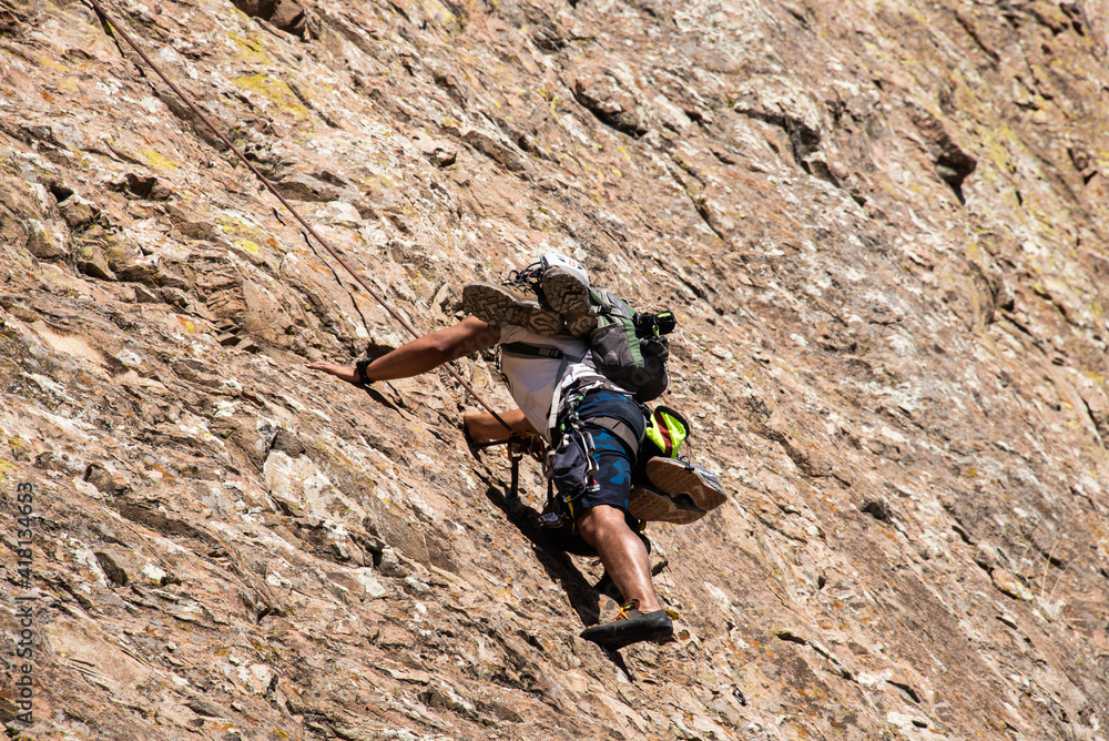 Obraz premium A rock climber on Peña de Bernal, UNESCO site and one of the world’s largest monoliths, Queretaro, Mexico