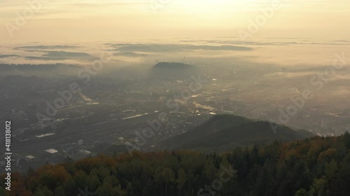 Aerial Cityscape of Graz with Grazer Schlosberg and historic buildings 4K sunrise in Graz, Styria region, Austria photo