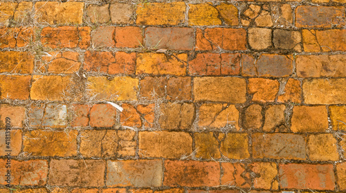 old brick wall with cracks