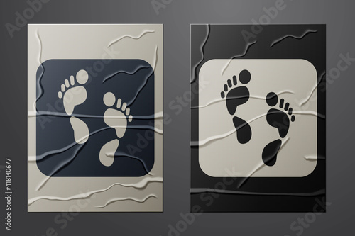 White Human footprint icon isolated on crumpled paper background. Trace of human foot. Paper art style. Vector.