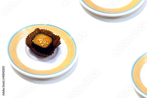 Composition of plates and cake. On a white isolated background close-up. View from above. Background for your design.