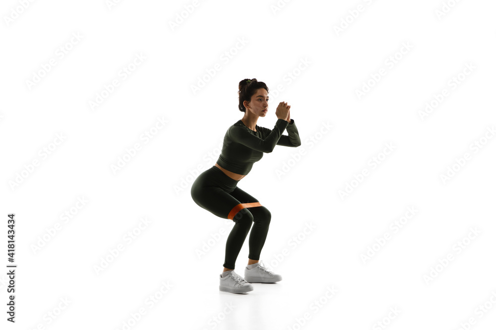 Cardio. Young caucasian female model in action, motion isolated on white background with copyspace. Concept of sport, movement, energy and dynamic, healthy lifestyle. Training, practicing. Cardio. Young caucasian female model in action, motion isolated on white background with copyspace. Concept of sport, movement, energy and dynamic, healthy lifestyle. Training, practicing.