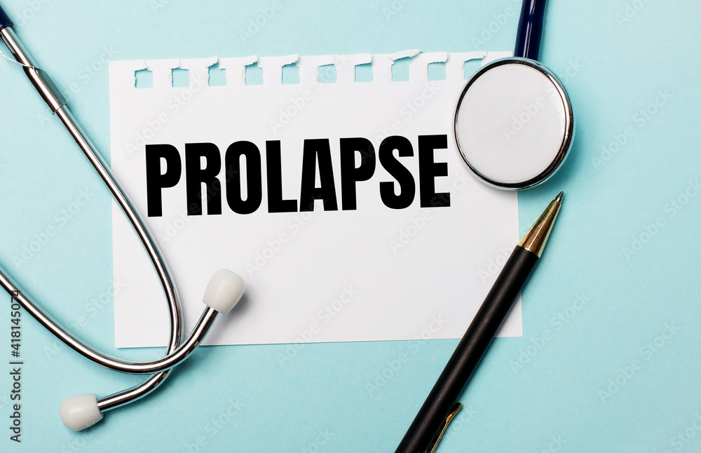 On a light blue background, a stethoscope, a pen and a sheet of paper with the inscription PROLAPSE. Medical concept On a light blue background, a stethoscope, a pen and a sheet of paper with the inscription PROLAPSE. Medical concept