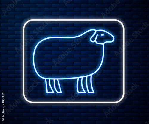 Glowing neon line Sheep icon isolated on brick wall background. Animal symbol. Vector.